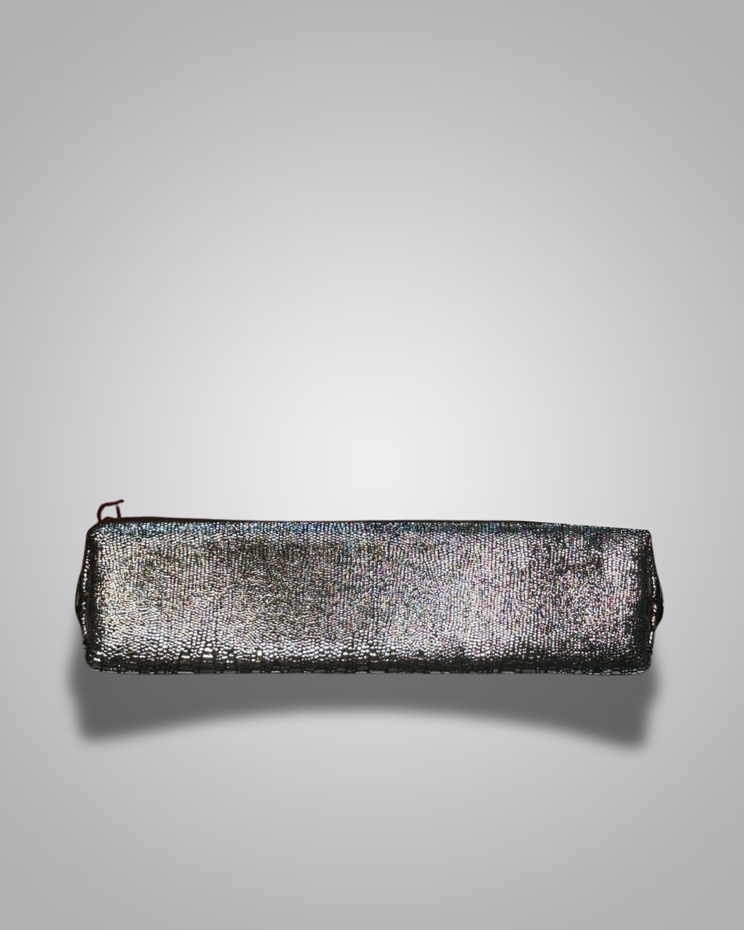 Vintage handbag with metallic sheen on a gray background- Valentino Impex