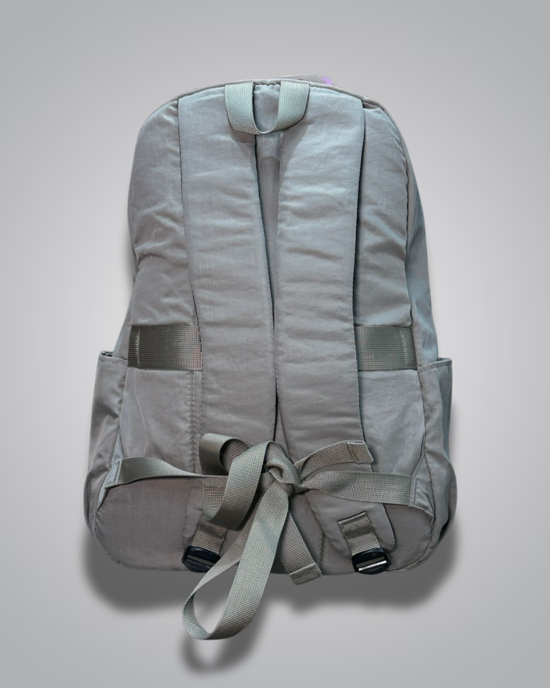 Gray backpack on a light gray background- valentini impex