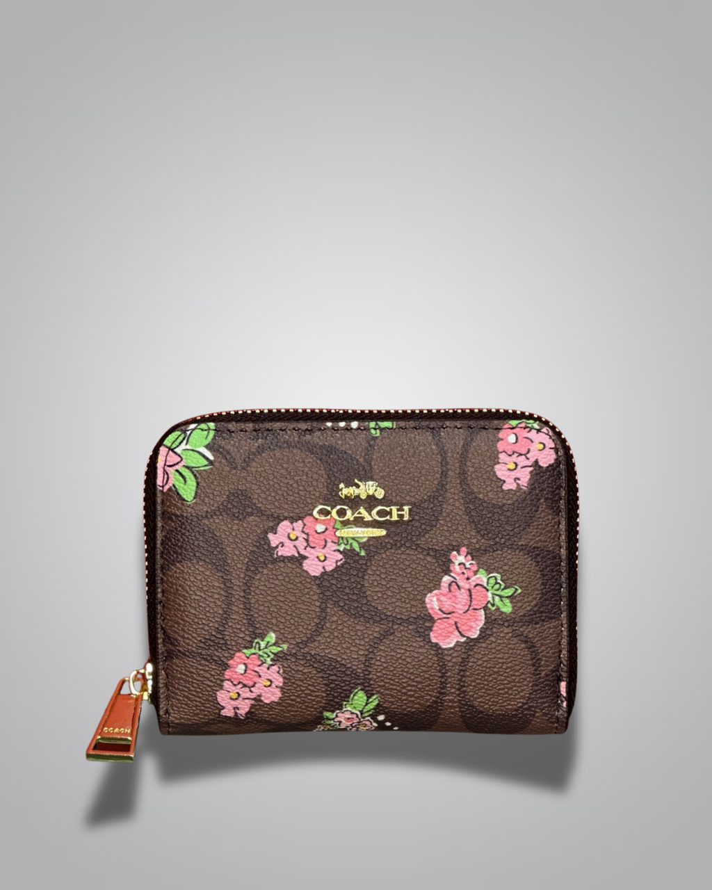 Coach wallet with floral design on a gray background- Valentino Impex