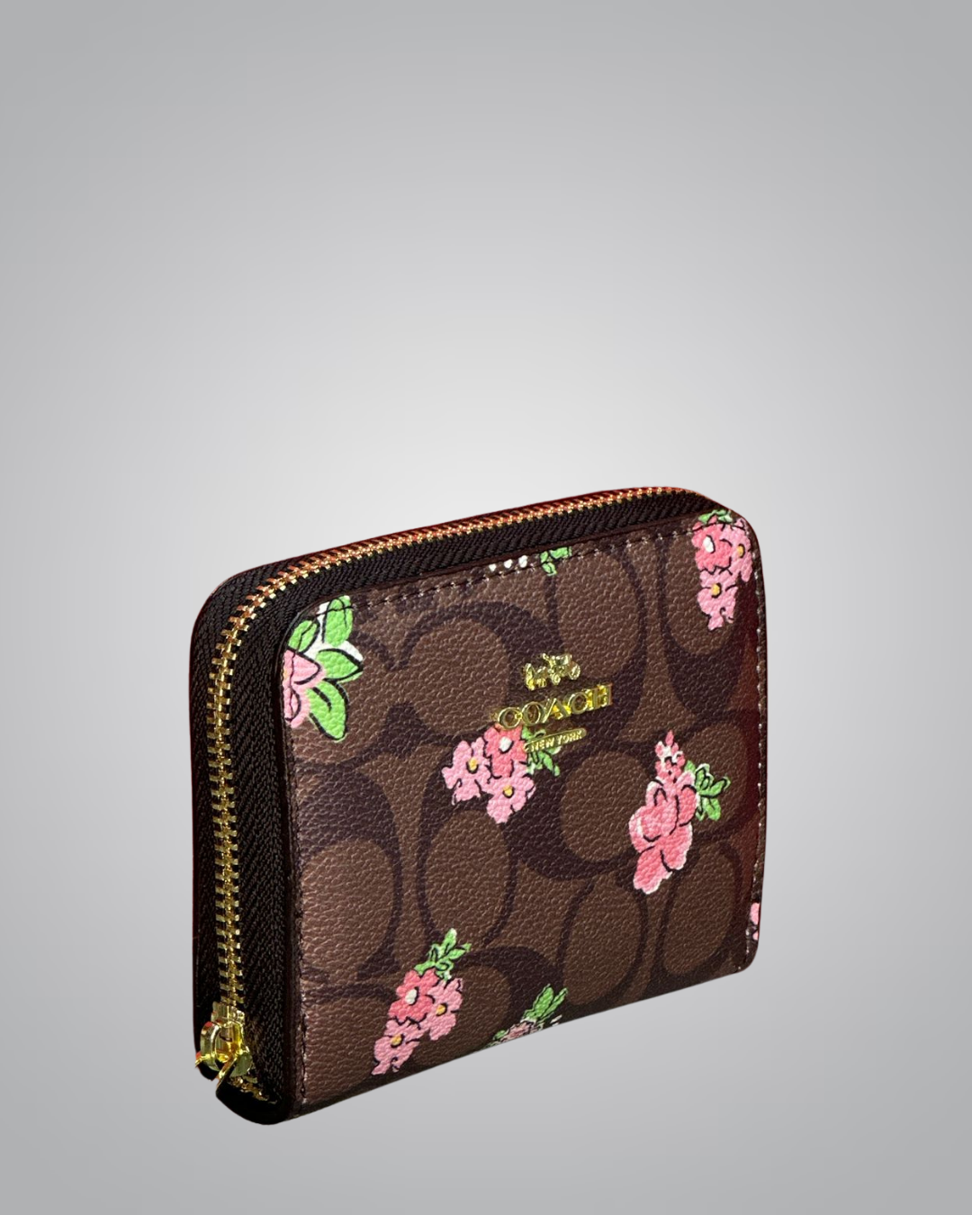 Coach wallet with floral design on a gray background- Valentino Impex