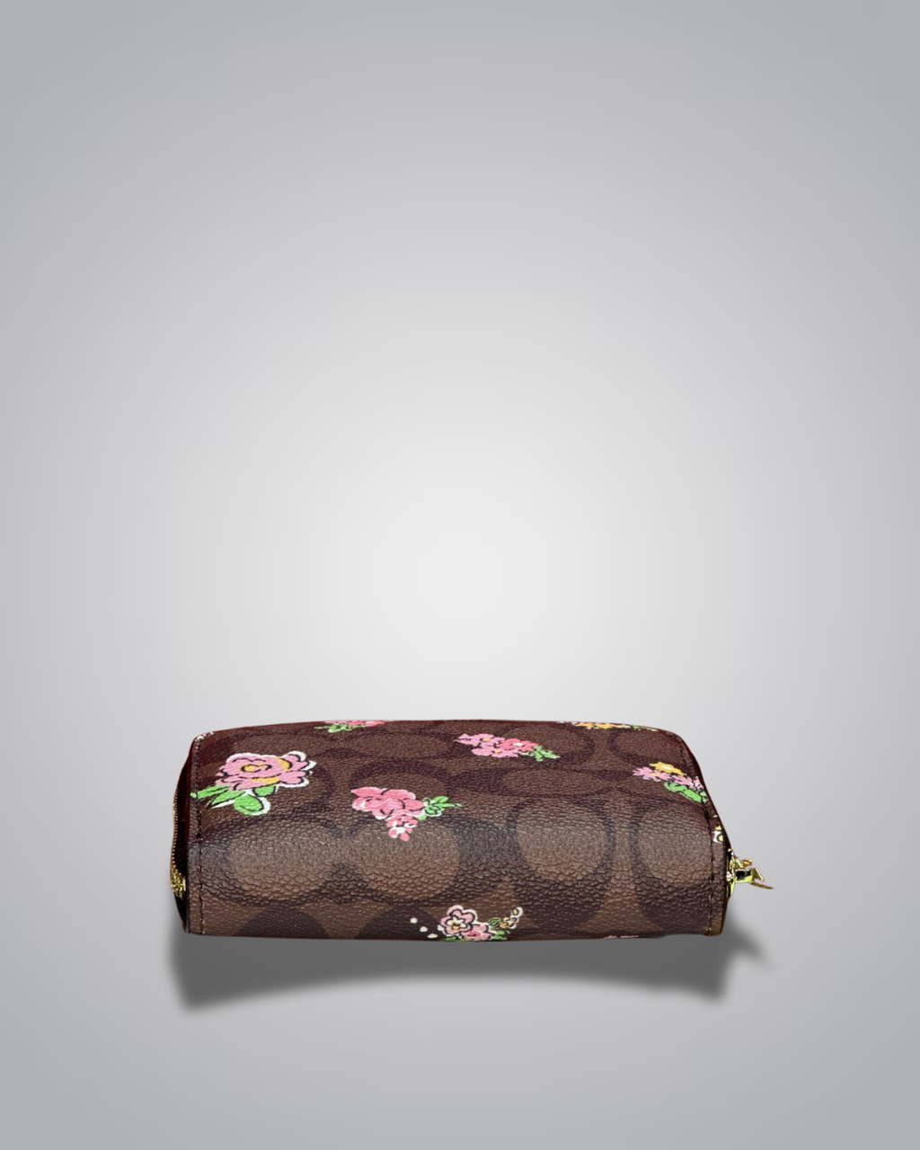 Coach wallet with floral design on a gray background- Valentino Impex