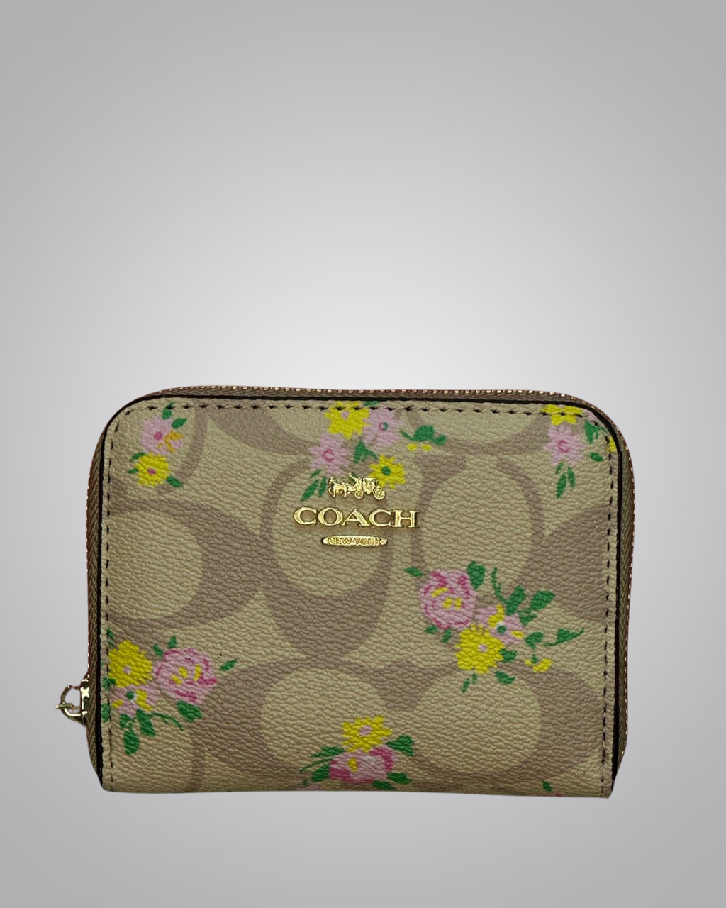 view of Coach Signature Floral Zip Wallet in beige with yellow and pink flower accents- Valentino Impex

