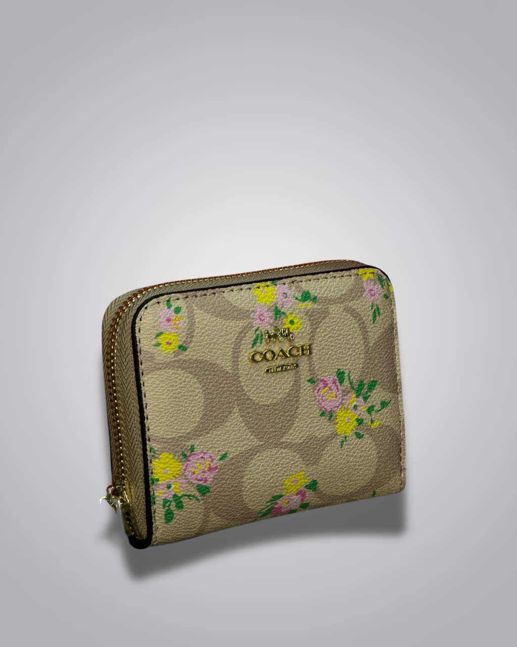 view of Coach Signature Floral Zip Wallet in beige with yellow and pink flower accents- Valentino Impex
