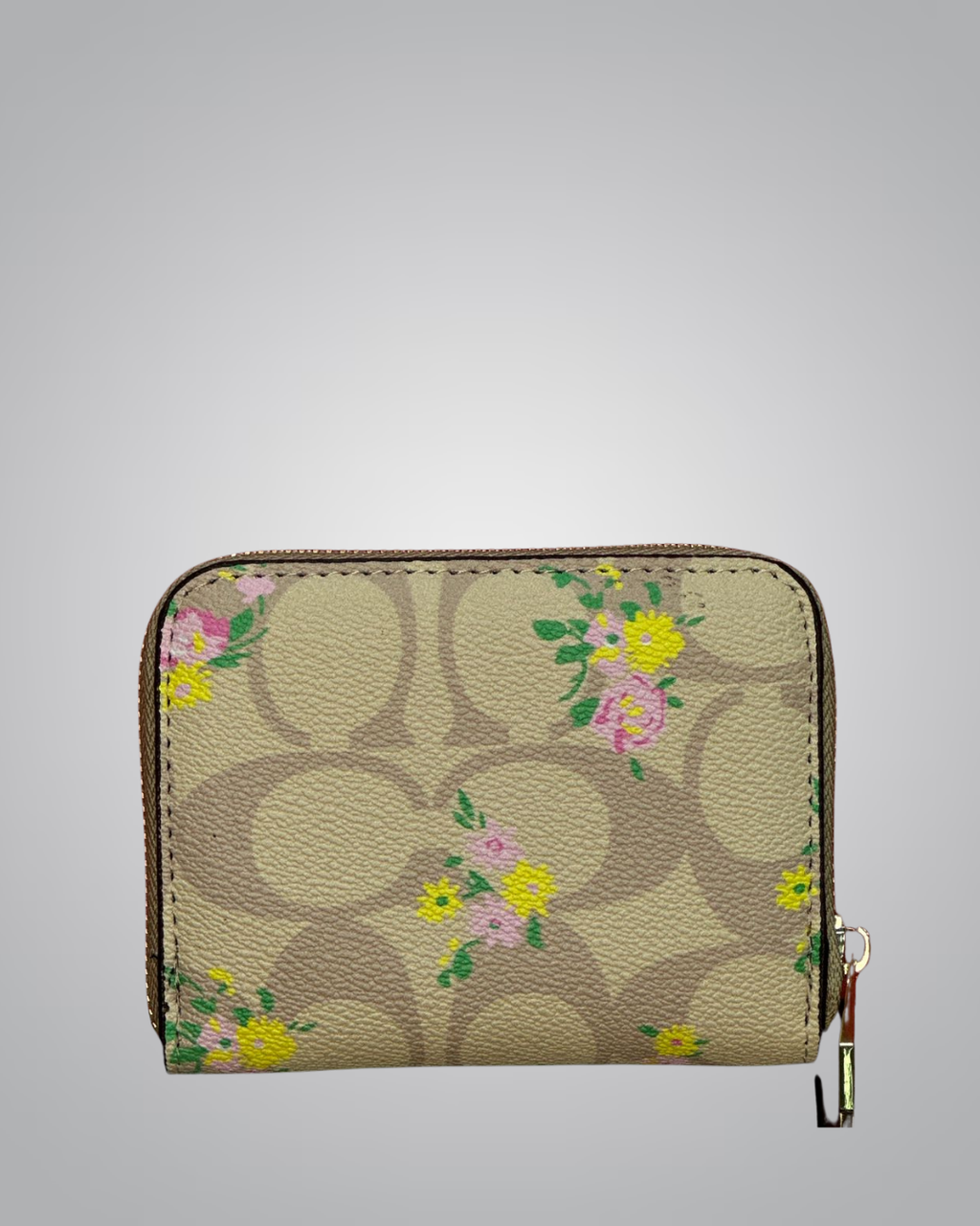 view of Coach Signature Floral Zip Wallet in beige with yellow and pink flower accents- Valentino Impex
