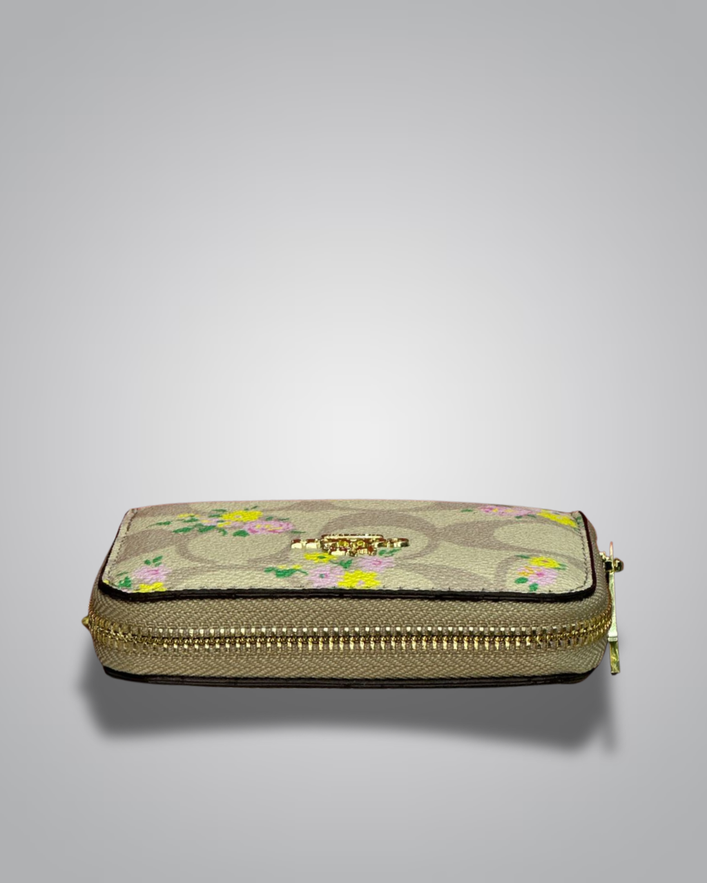 view of Coach Signature Floral Zip Wallet in beige with yellow and pink flower accents- Valentino Impex
