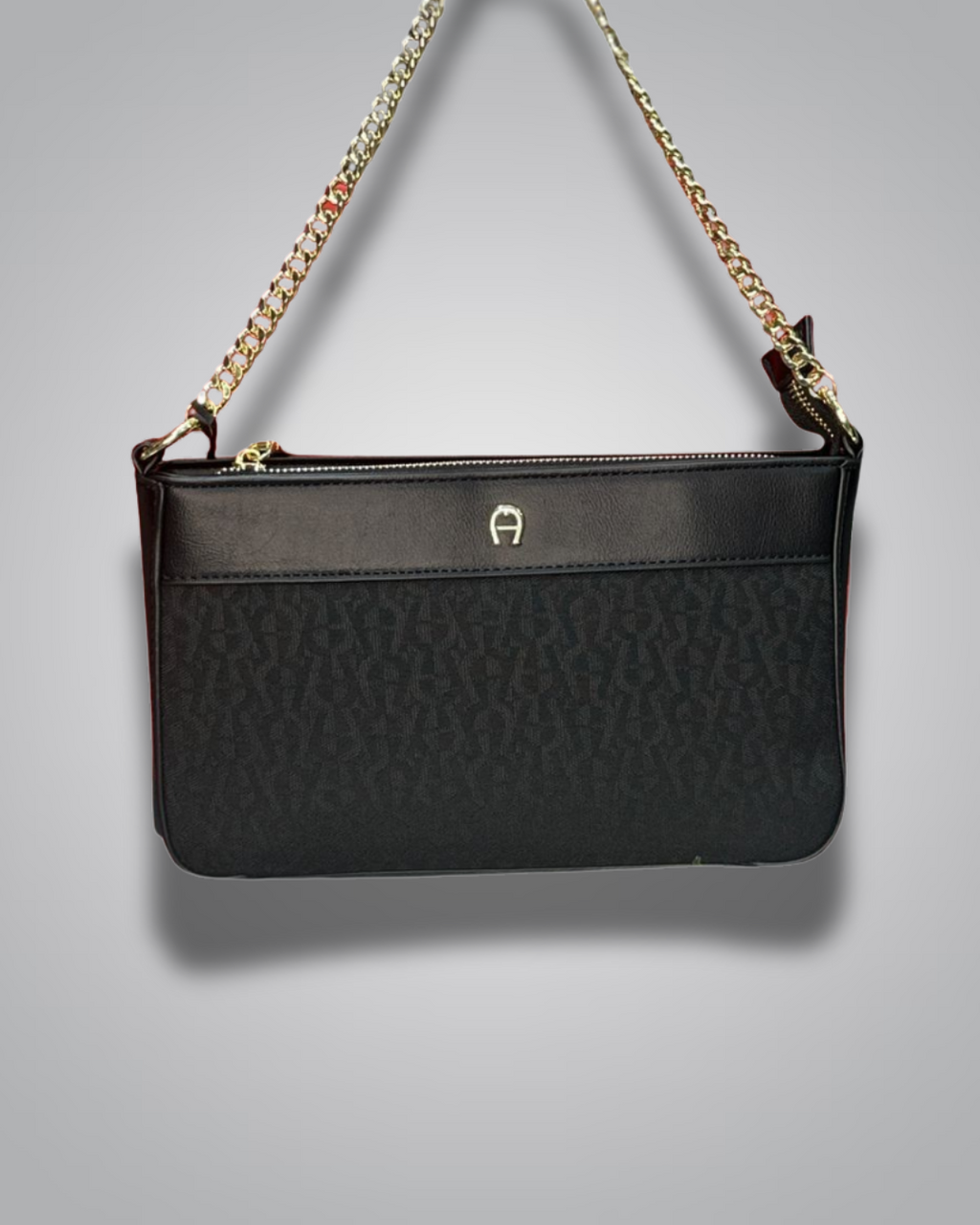 Black handbag with gold chain strap on a gray background- Valentino Impex