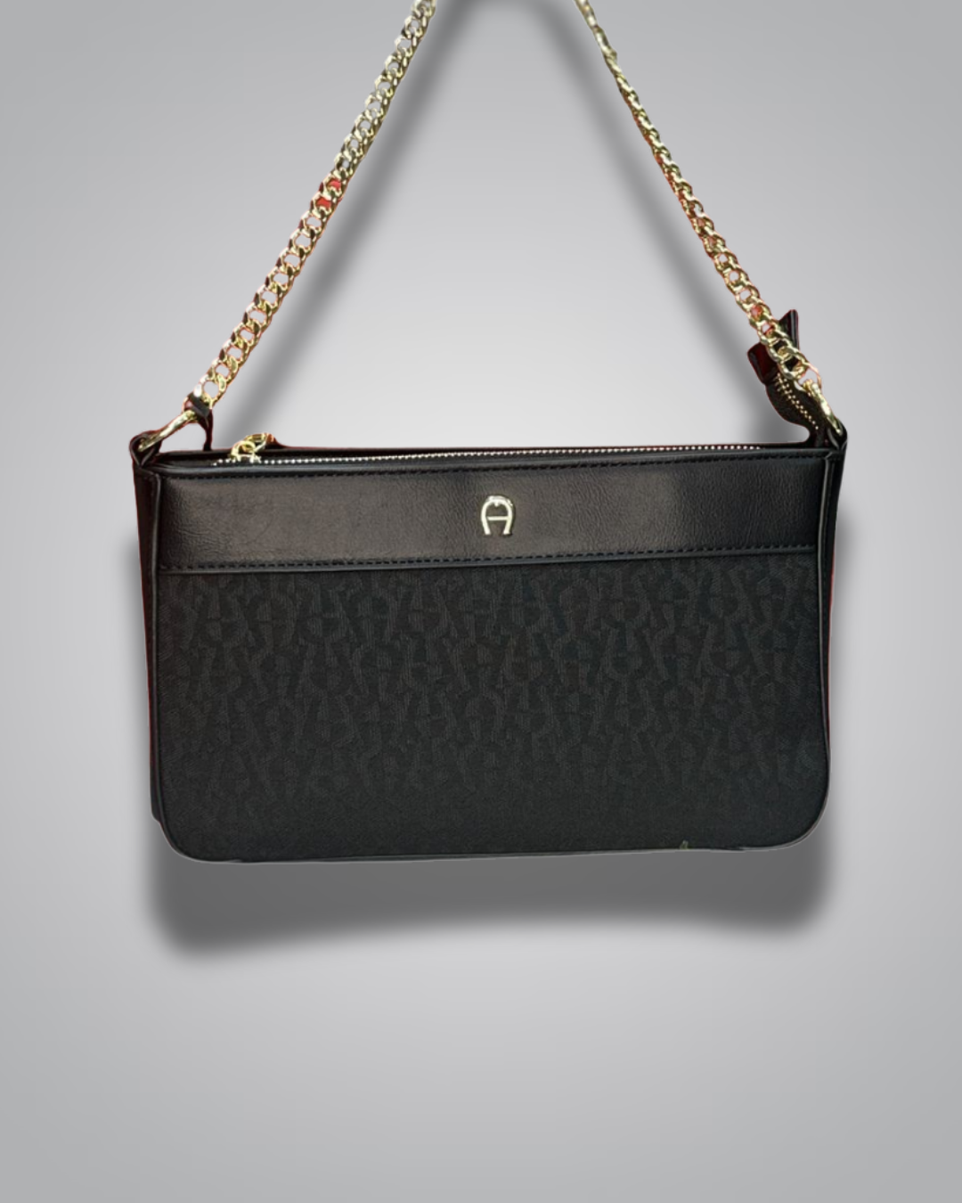 Black handbag with gold chain strap on a gray background- Valentino Impex