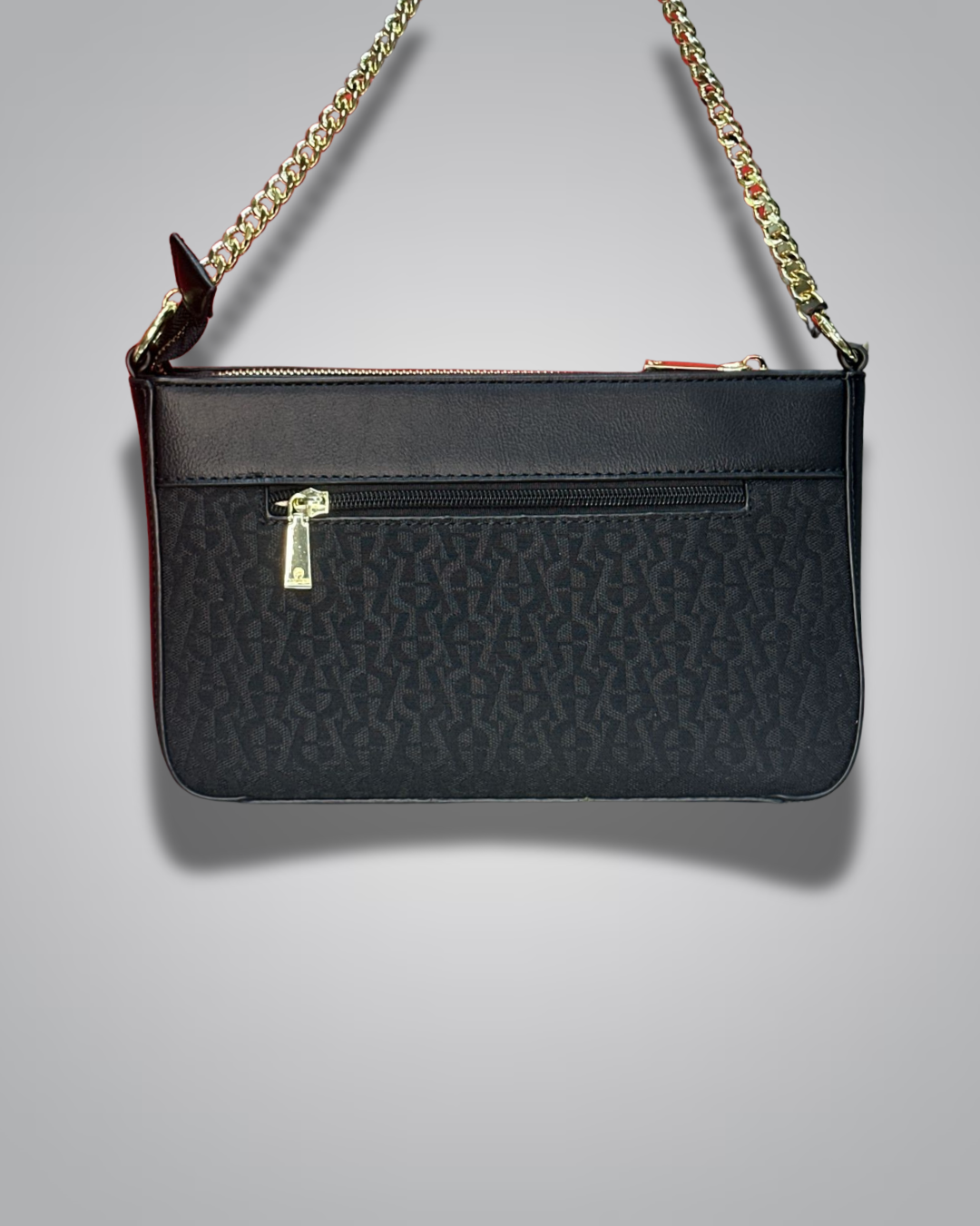 Black handbag with gold chain strap on a gray background- Valentino Impex