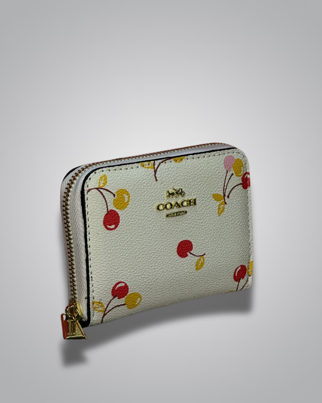 Coach cream zip wallet with red and yellow cherry print and gold Coach logo- Valentino Impex