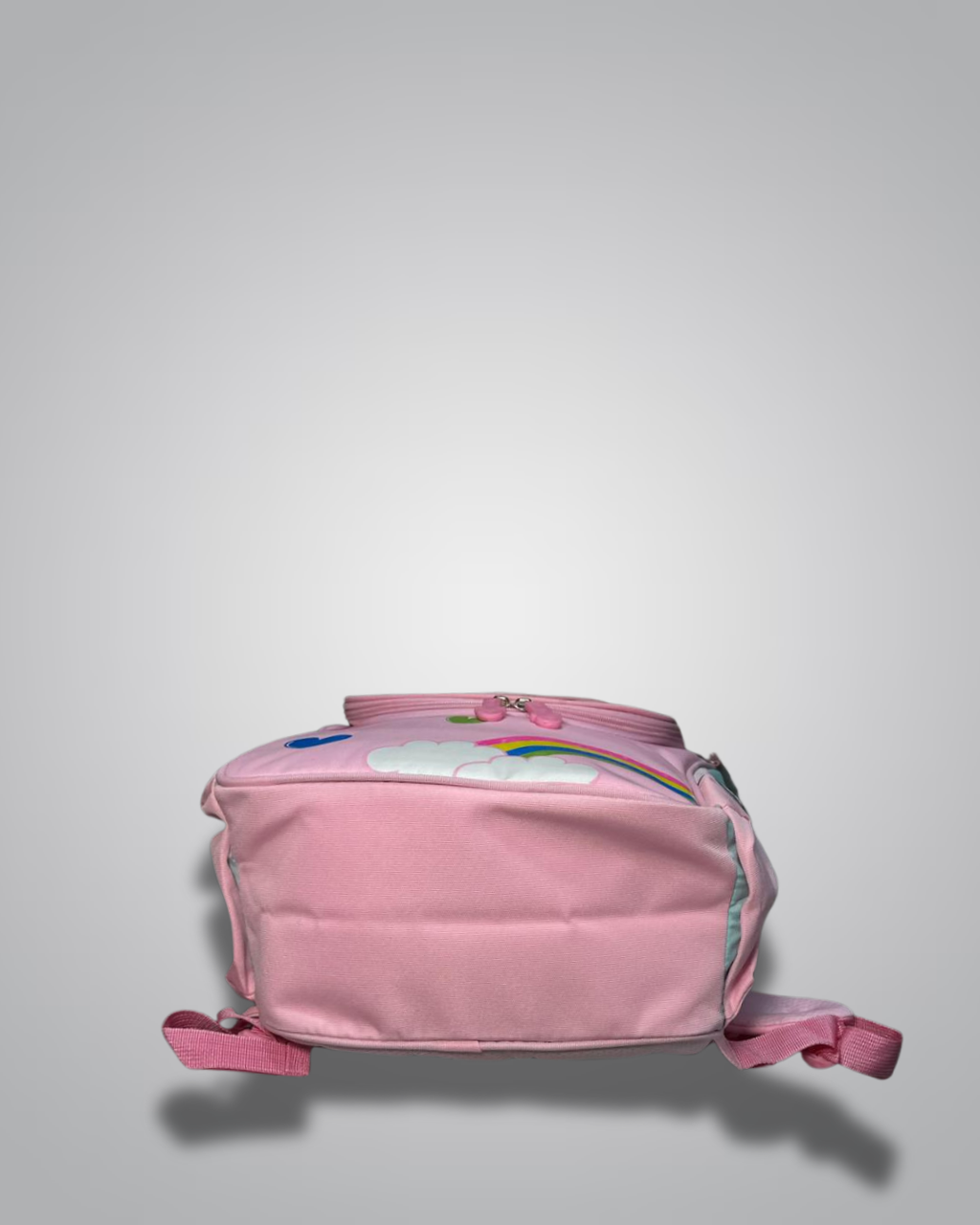 Pink backpack with colorful designs on a light gray background- Valentino Impex