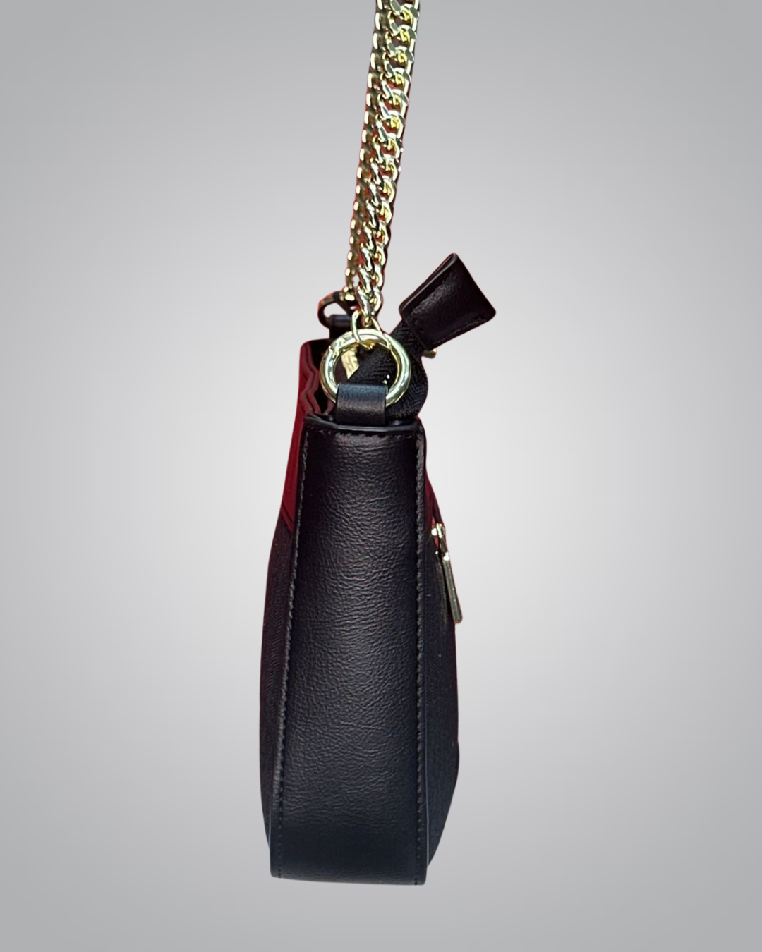 Black handbag with gold chain strap on a gray background- Valentino Impex
