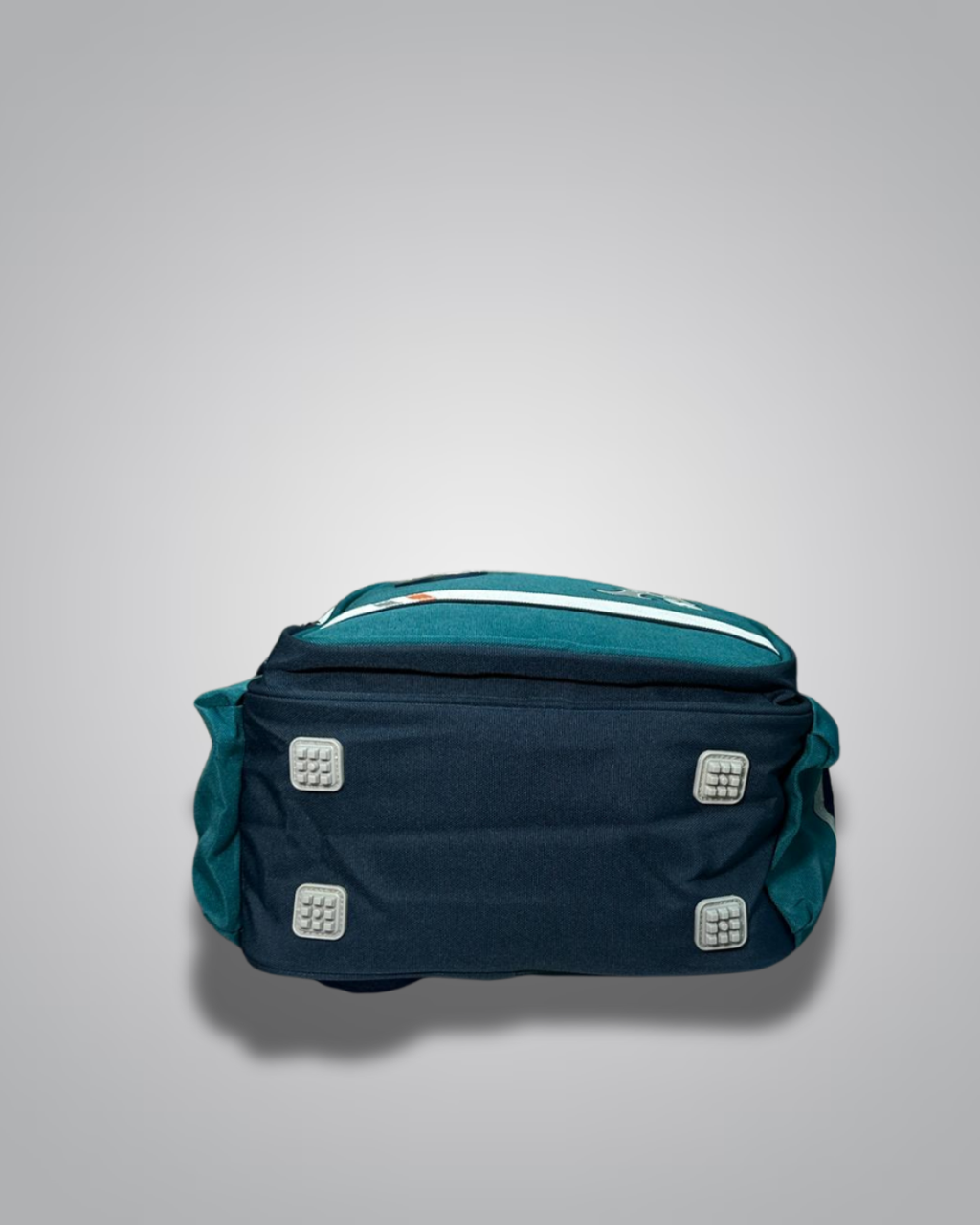 Teal bag with silver accents on a light gray background- Valentino Impex