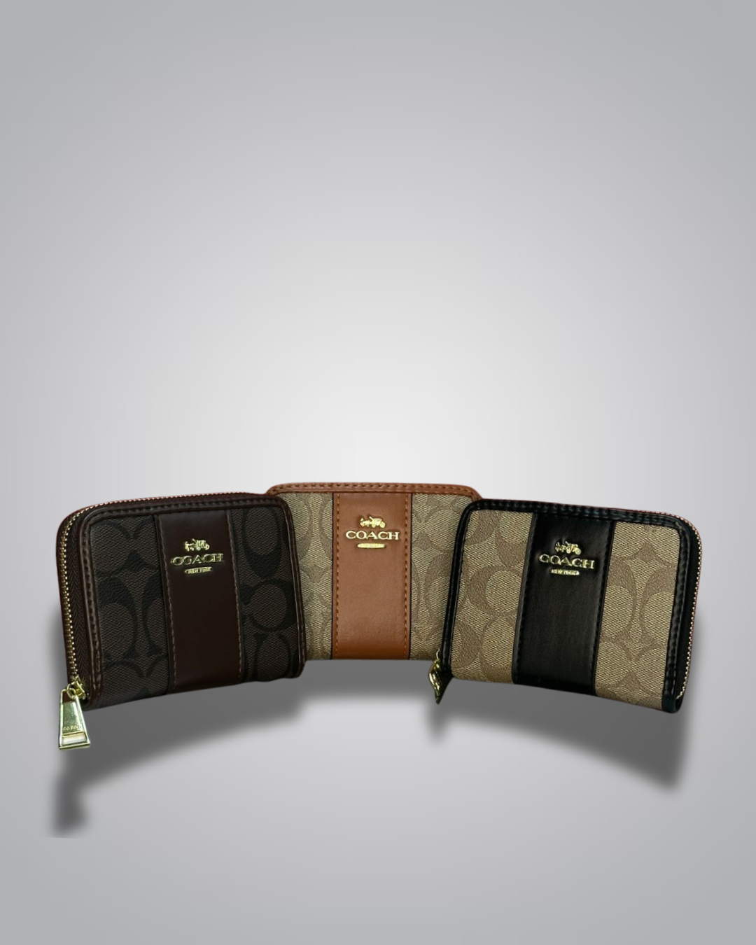 Coach wallet with multiple color options on a gray background