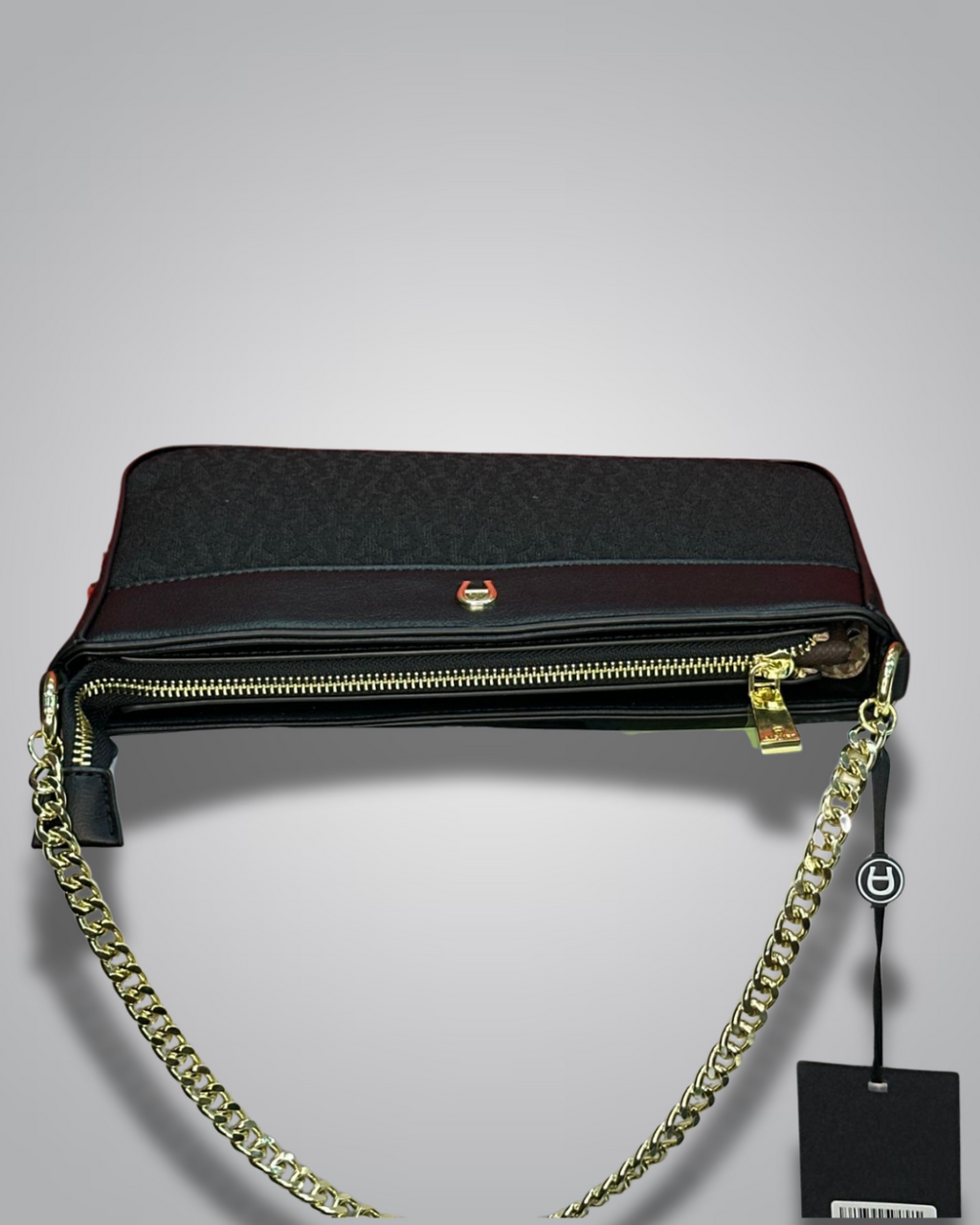 Black handbag with gold chain strap on a gray background- Valentino Impex