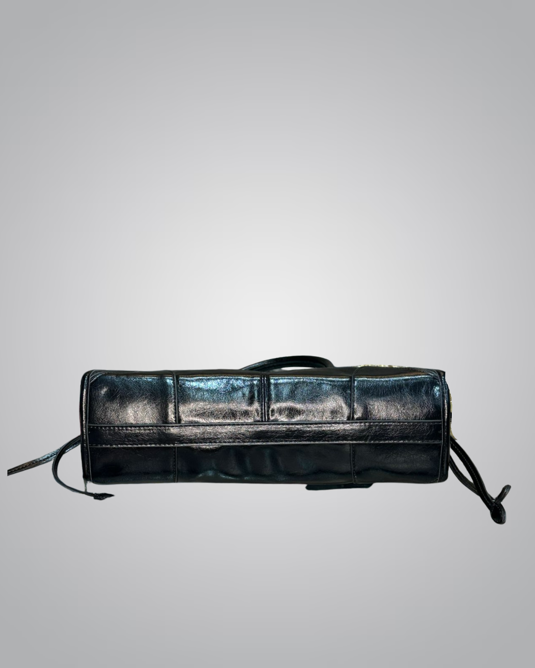 Black leather wallet with multiple card slots on a light gray background