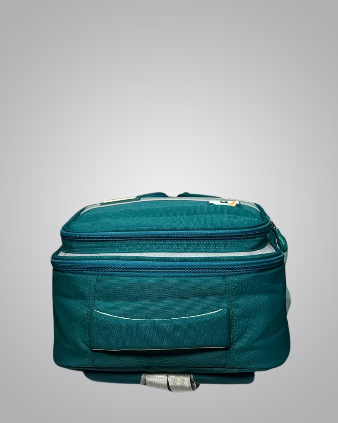Teal suitcase on a light gray background