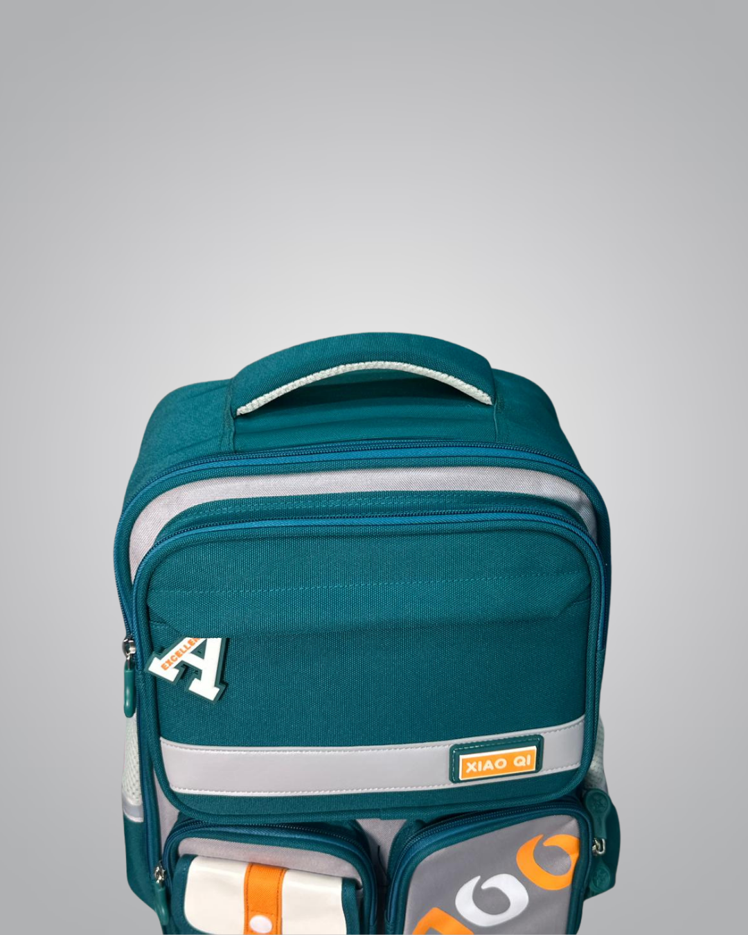 Teal backpack with white accents on a gray background