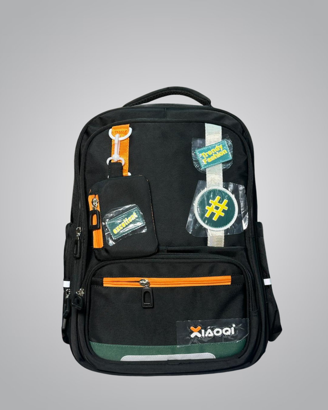 Black backpack with various patches and a visible brand logo on a gray background