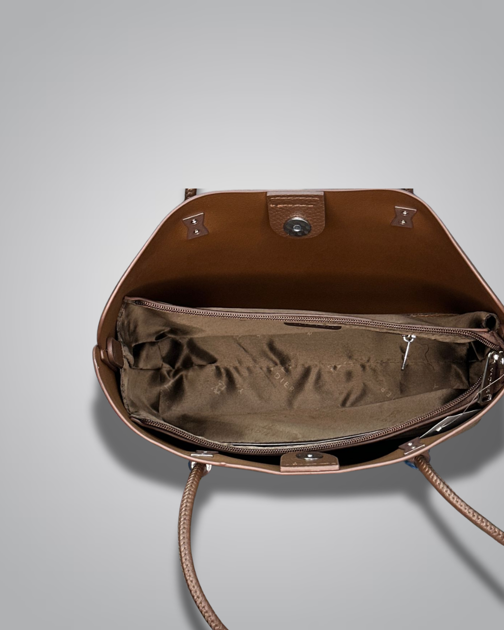 Beige handbag with a sloth keychain on a light gray background- Valentino Impex