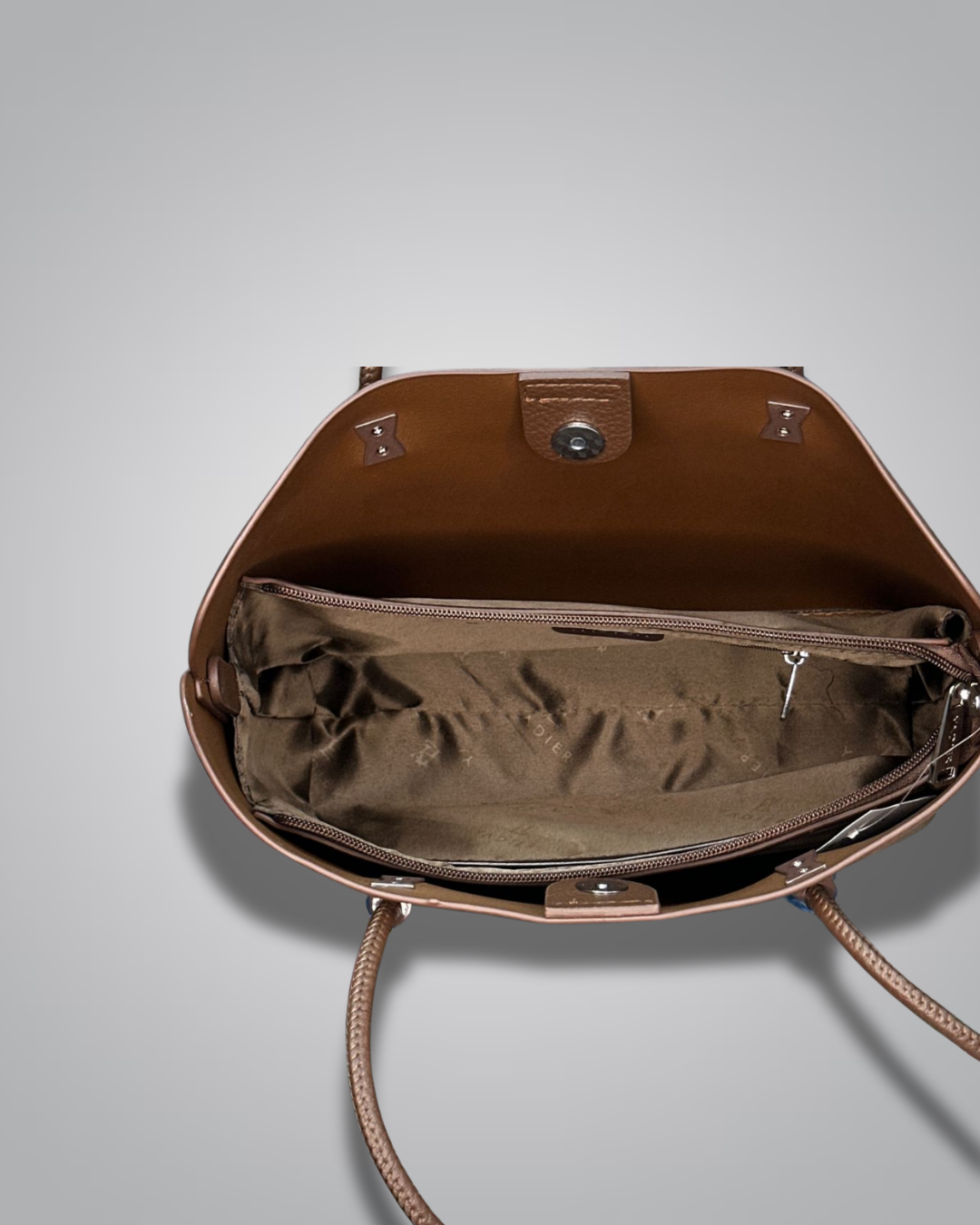 Beige handbag with a sloth keychain on a light gray background- Valentino Impex