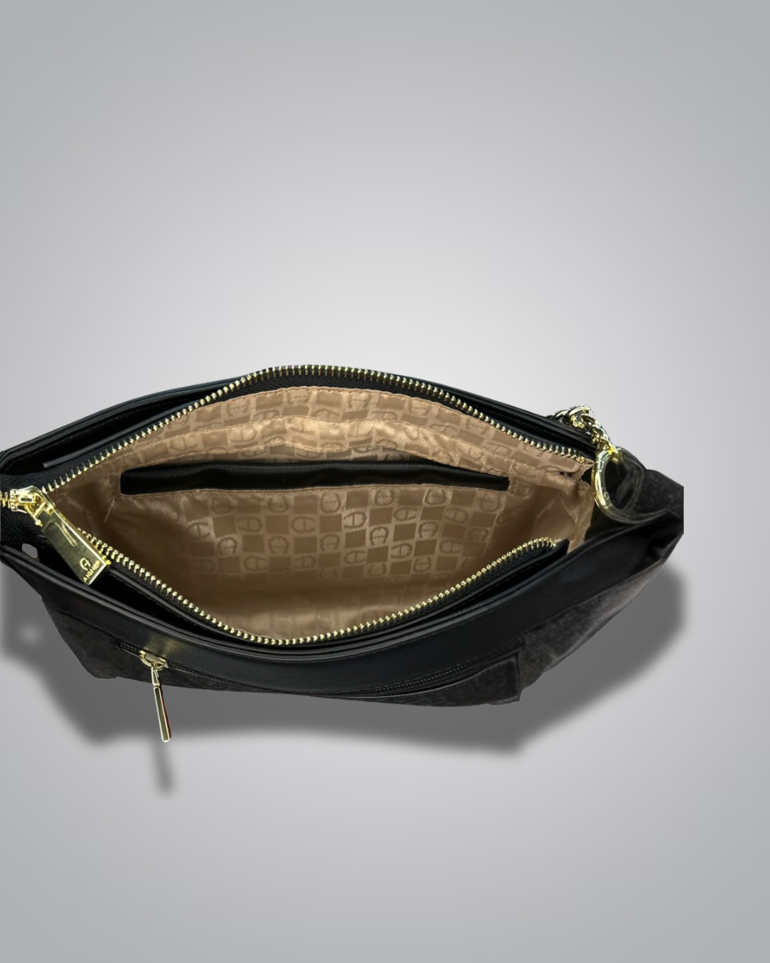 Black handbag with gold chain strap on a gray background- Valentino Impex