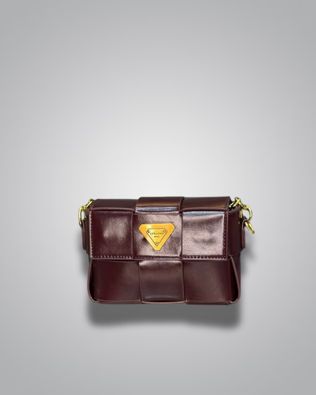 Brown leather handbag with gold accents on a gray background- Valentino Impex