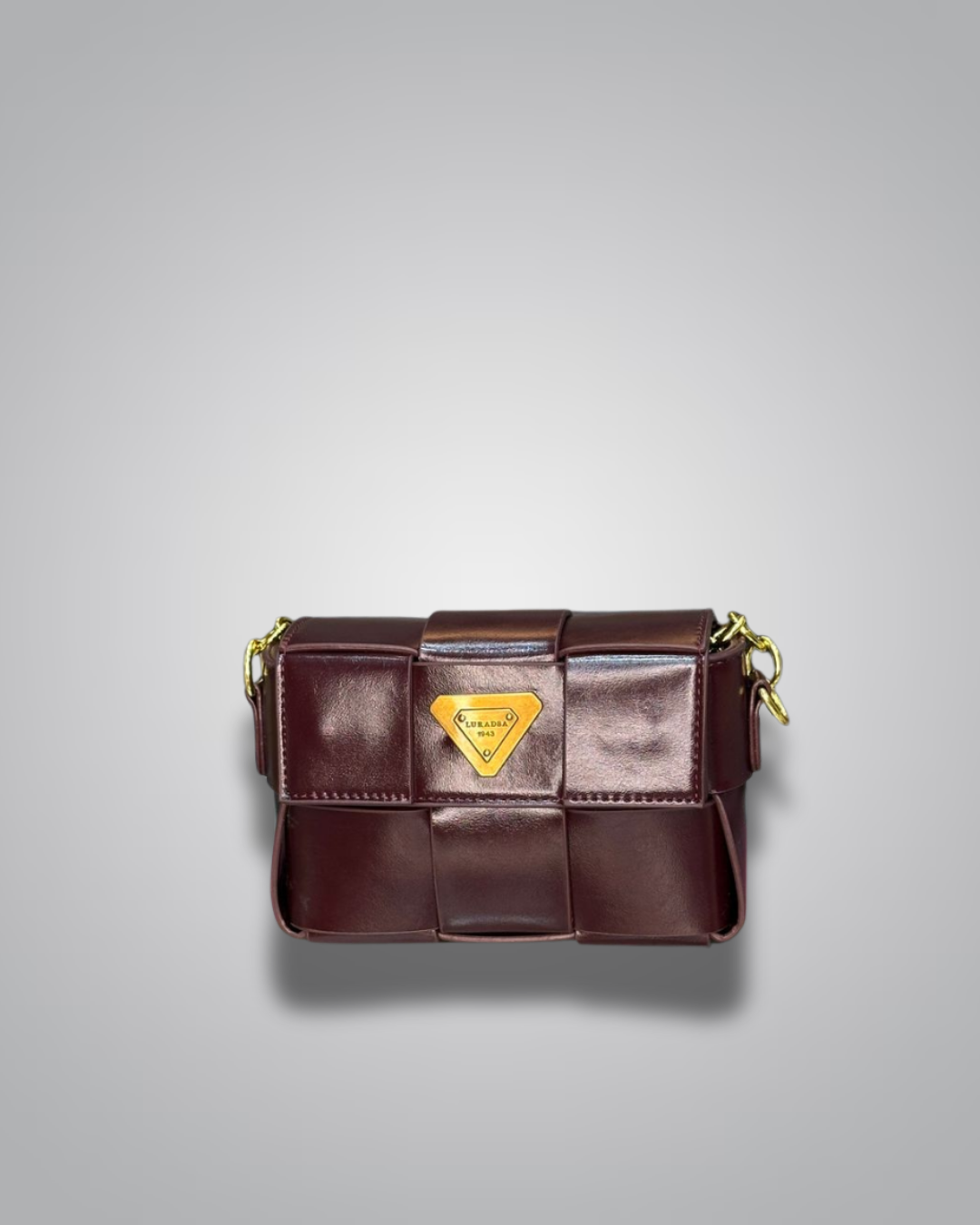 Brown leather handbag with gold accents on a gray background- Valentino Impex