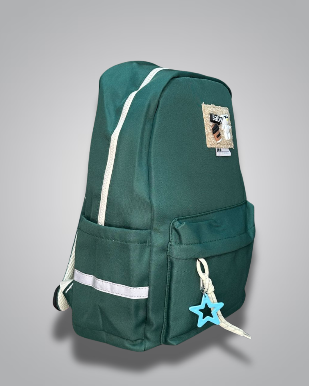 Green backpack with a patch on a gray background- Valentino Impex