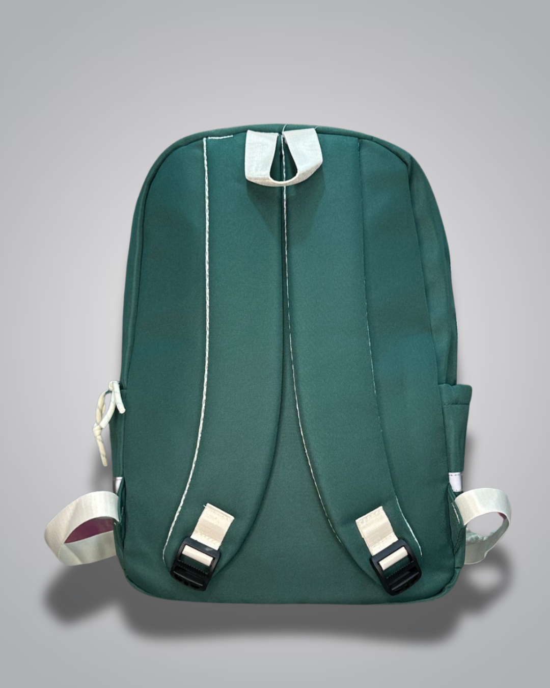 Green backpack with a patch on a gray background- Valentino Impex