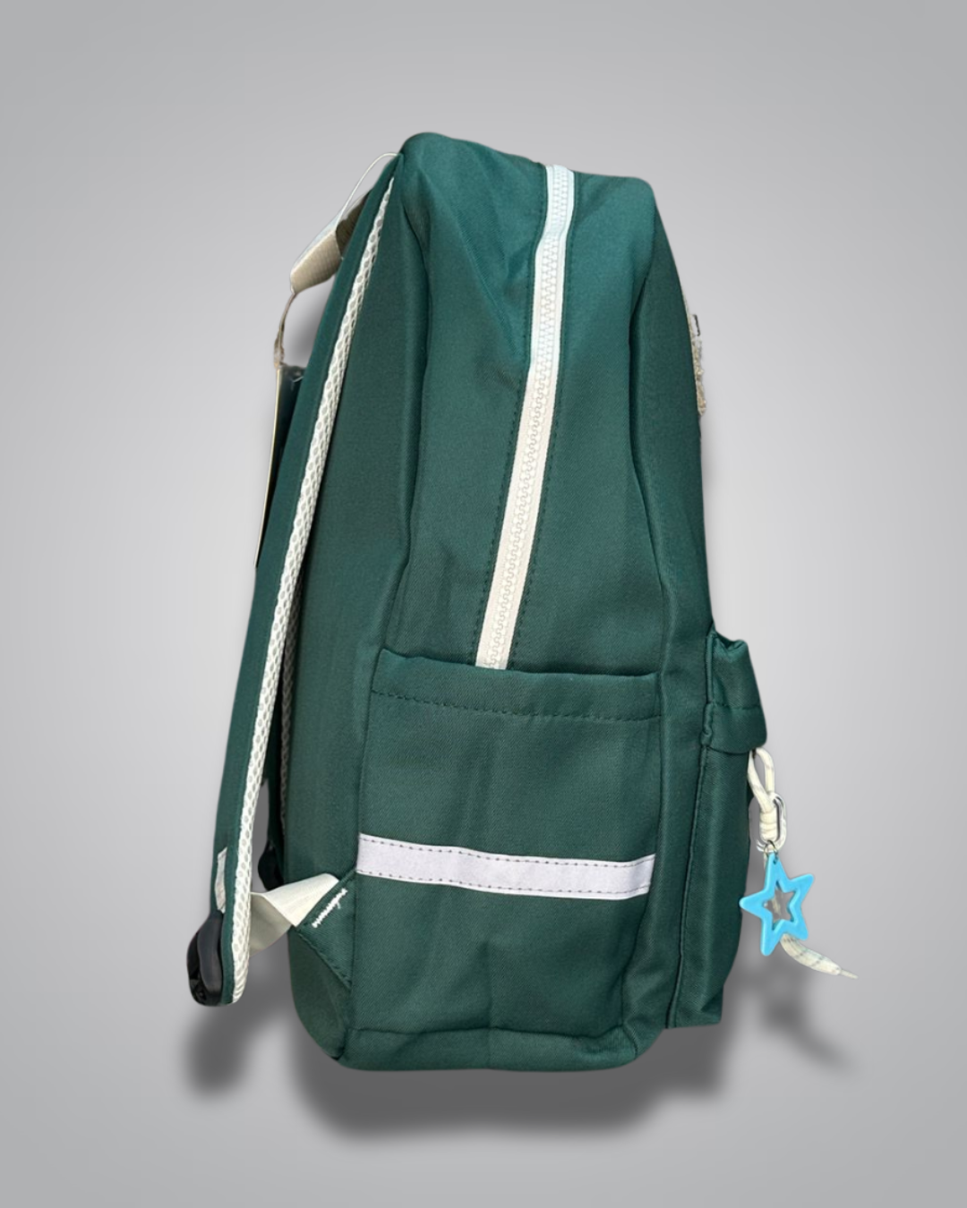 Green backpack with a patch on a gray background- Valentino Impex