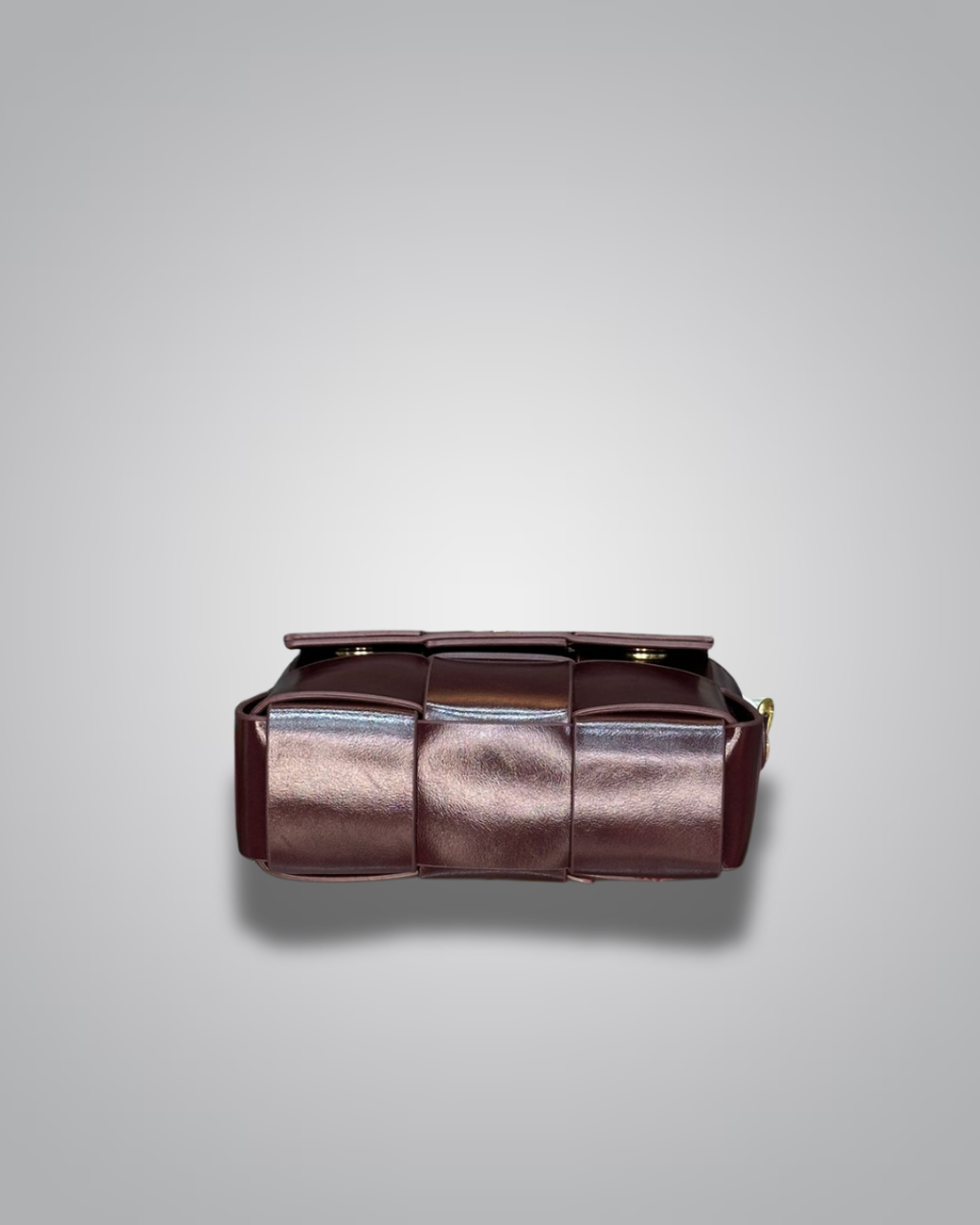 Brown leather handbag on a light gray background- Valentino Impex