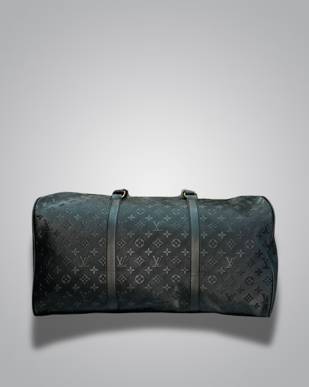 Black duffel bag with monogram pattern on a gray background