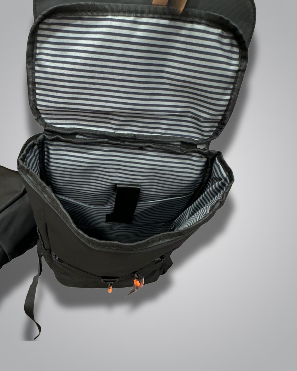 Black backpack with a visible brand label on a gray background- Valentino Impex