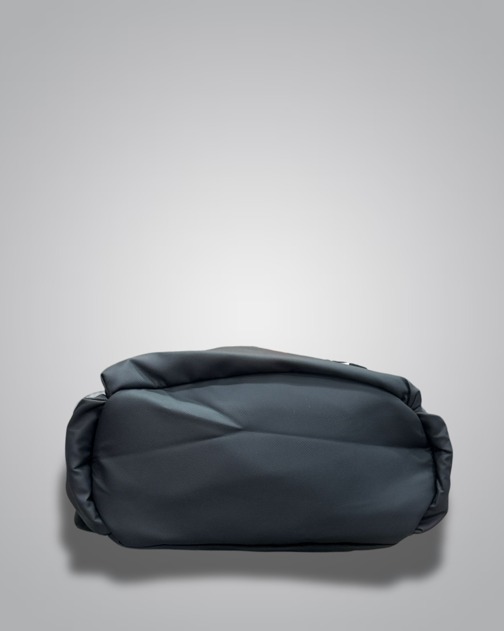 Black backpack with a visible brand label on a gray background- Valentino Impex
