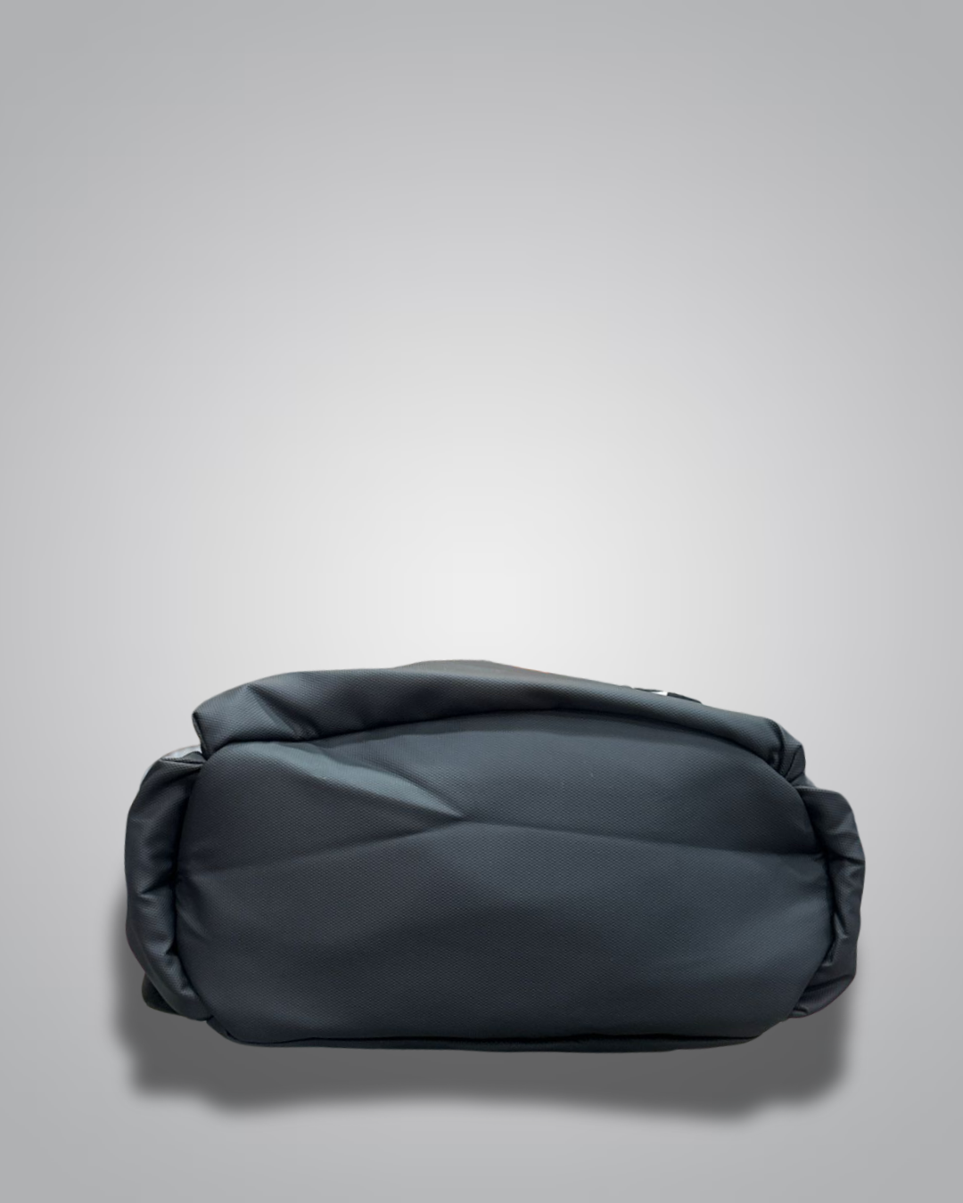 Black backpack with a visible brand label on a gray background- Valentino Impex