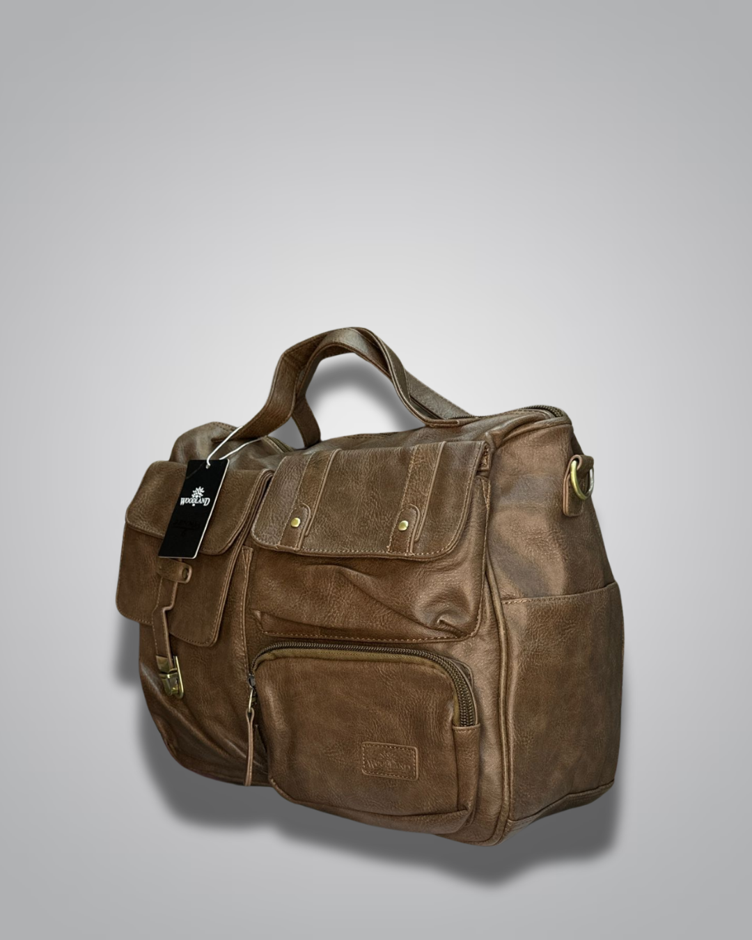 Brown leather bag with a tag on a light gray background- Valentino Impex