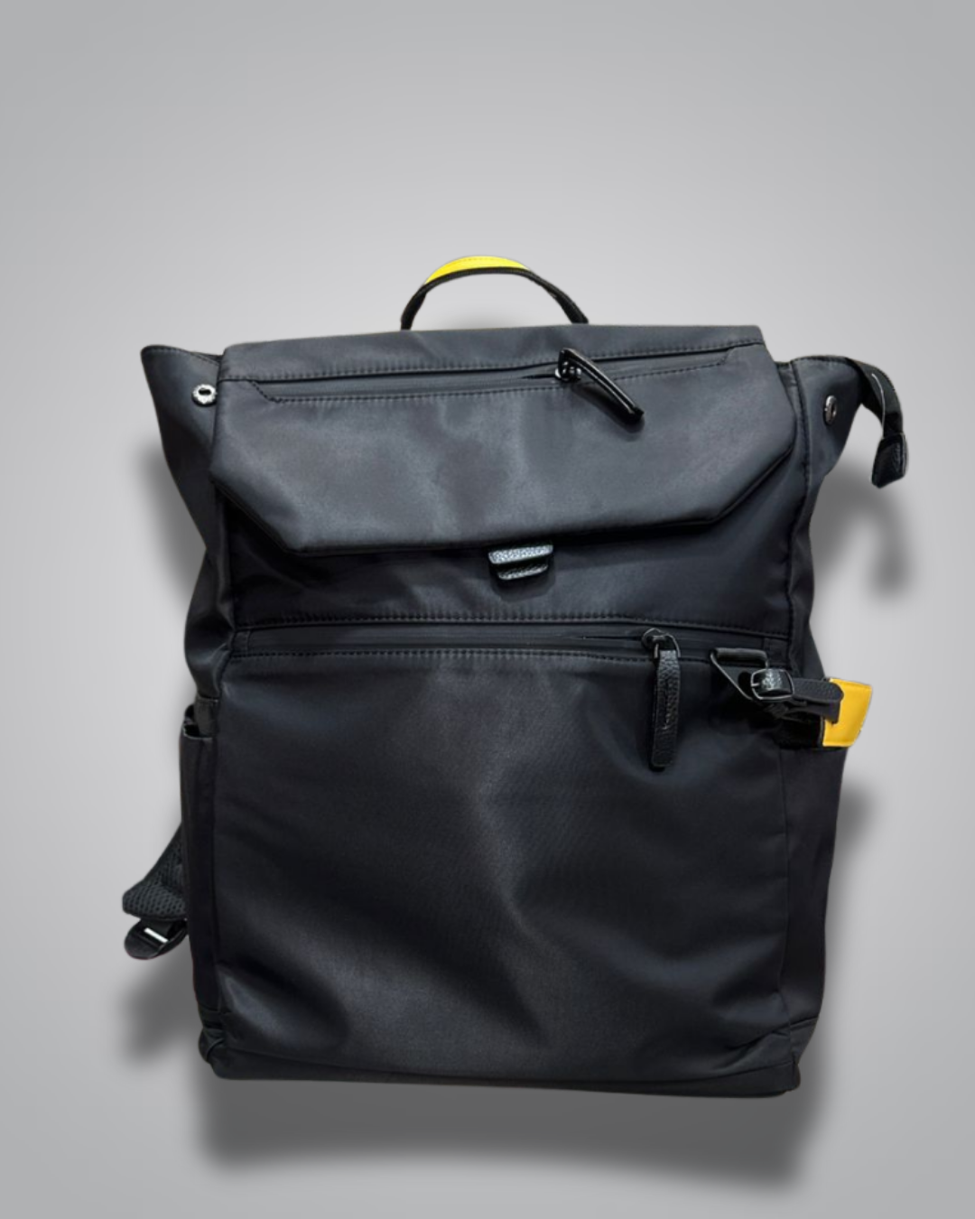 Black backpack with yellow accents on a gray background- Valentino Impex