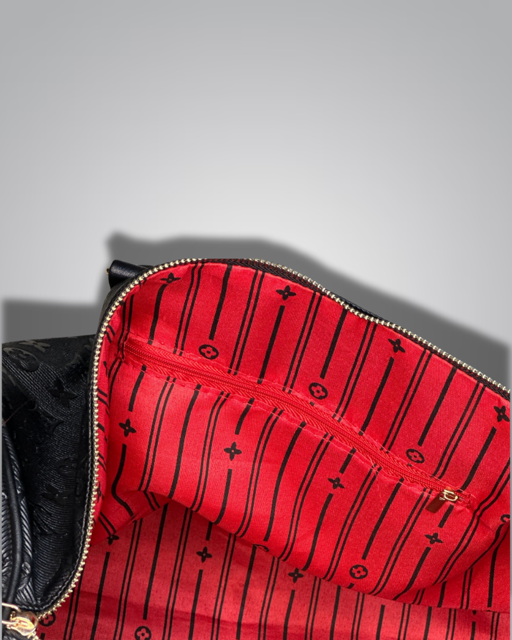 Red pouch with black patterns on a gray background