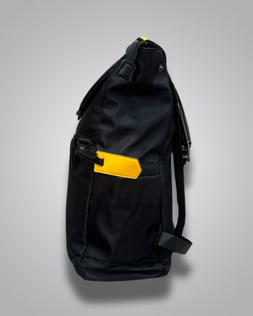 Black backpack with yellow accents on a gray background- Valentino Impex