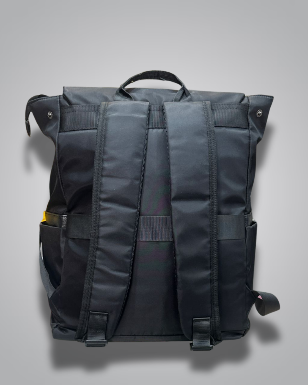 Black backpack with yellow accents on a gray background- Valentino Impex