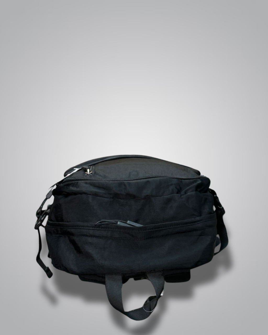 Black backpack with a visible brand label on a gray background- Valentino Impex
