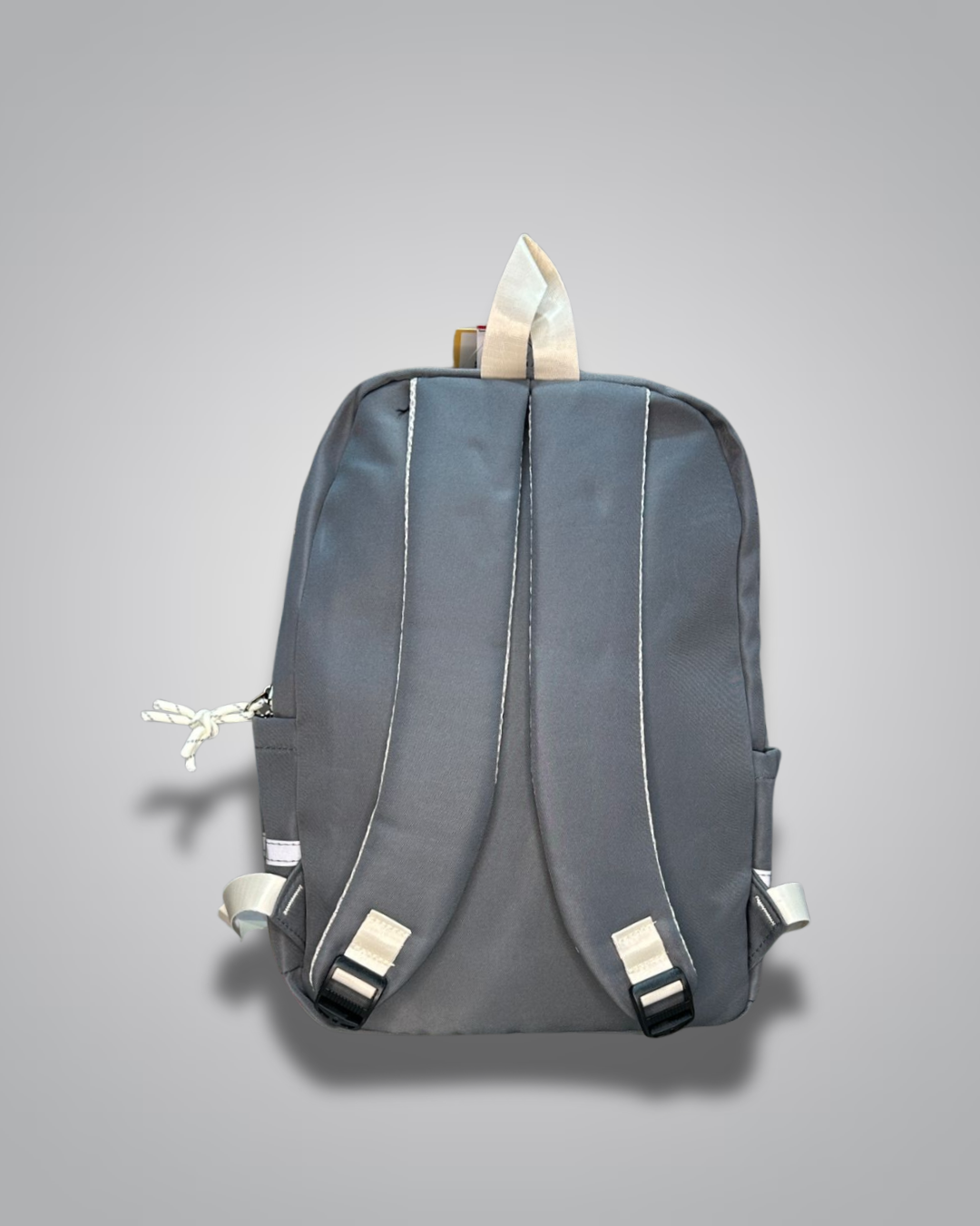 Gray backpack on a gray background- Valentino Impex