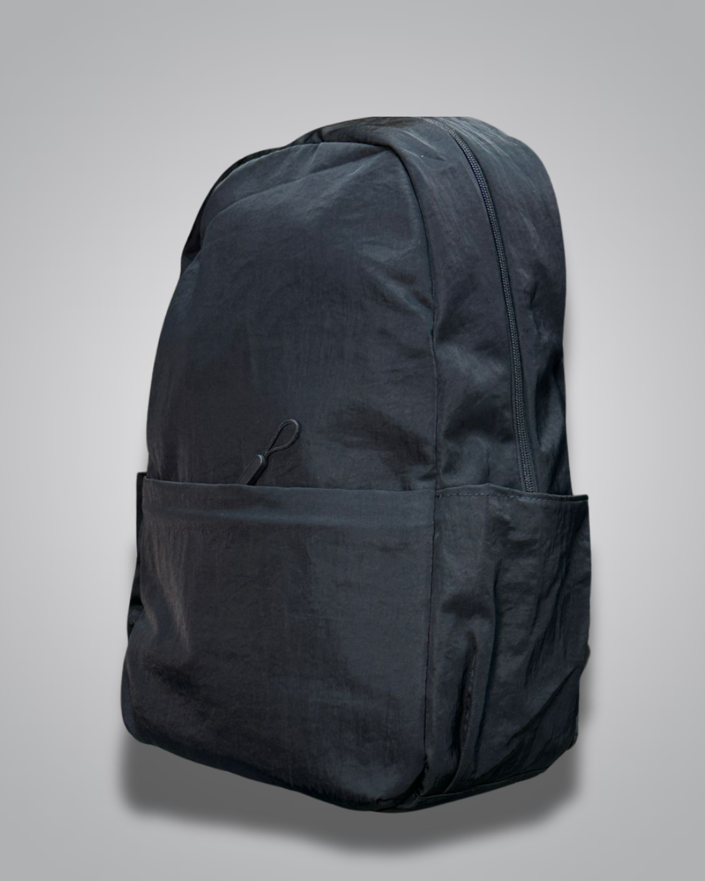 Black backpack on a light gray background- valentini impex