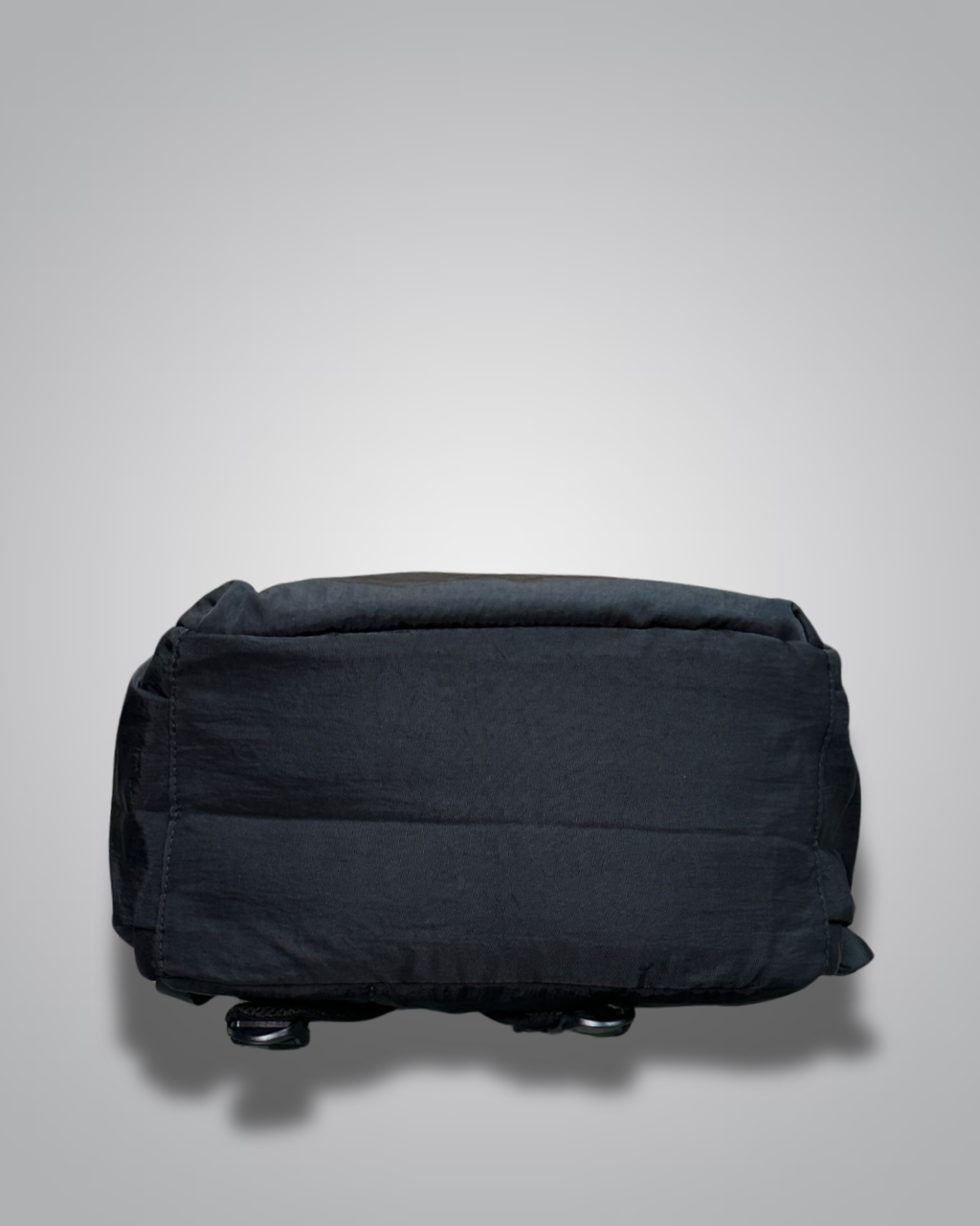 Black suitcase on a light gray background- valentini impex
