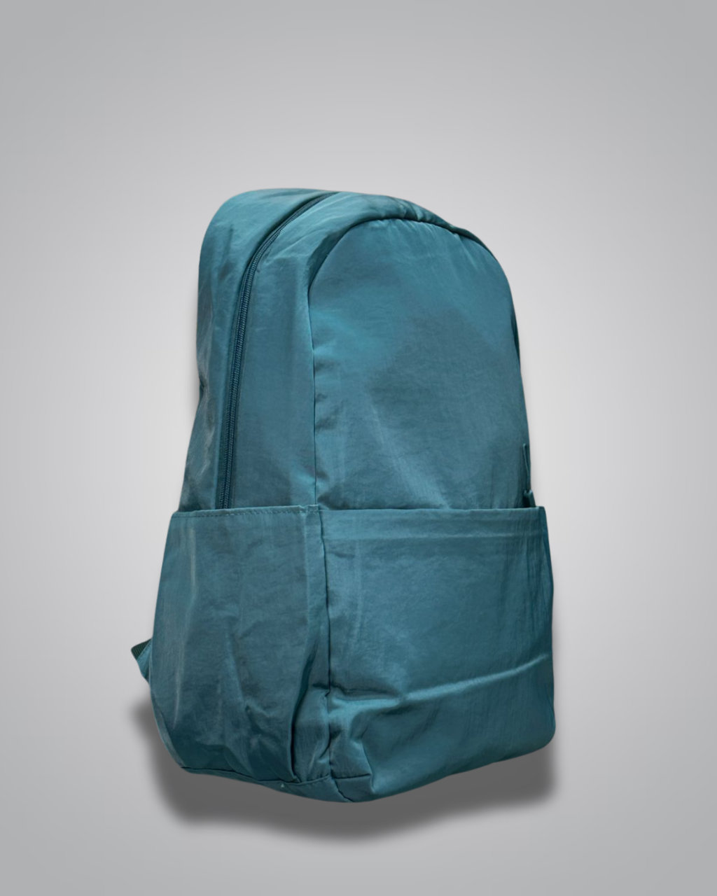 Teal backpack on a light gray background- valentini impex