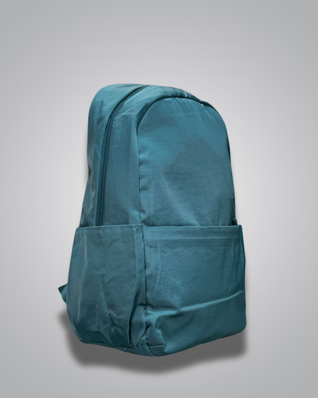 Teal backpack on a light gray background- valentini impex
