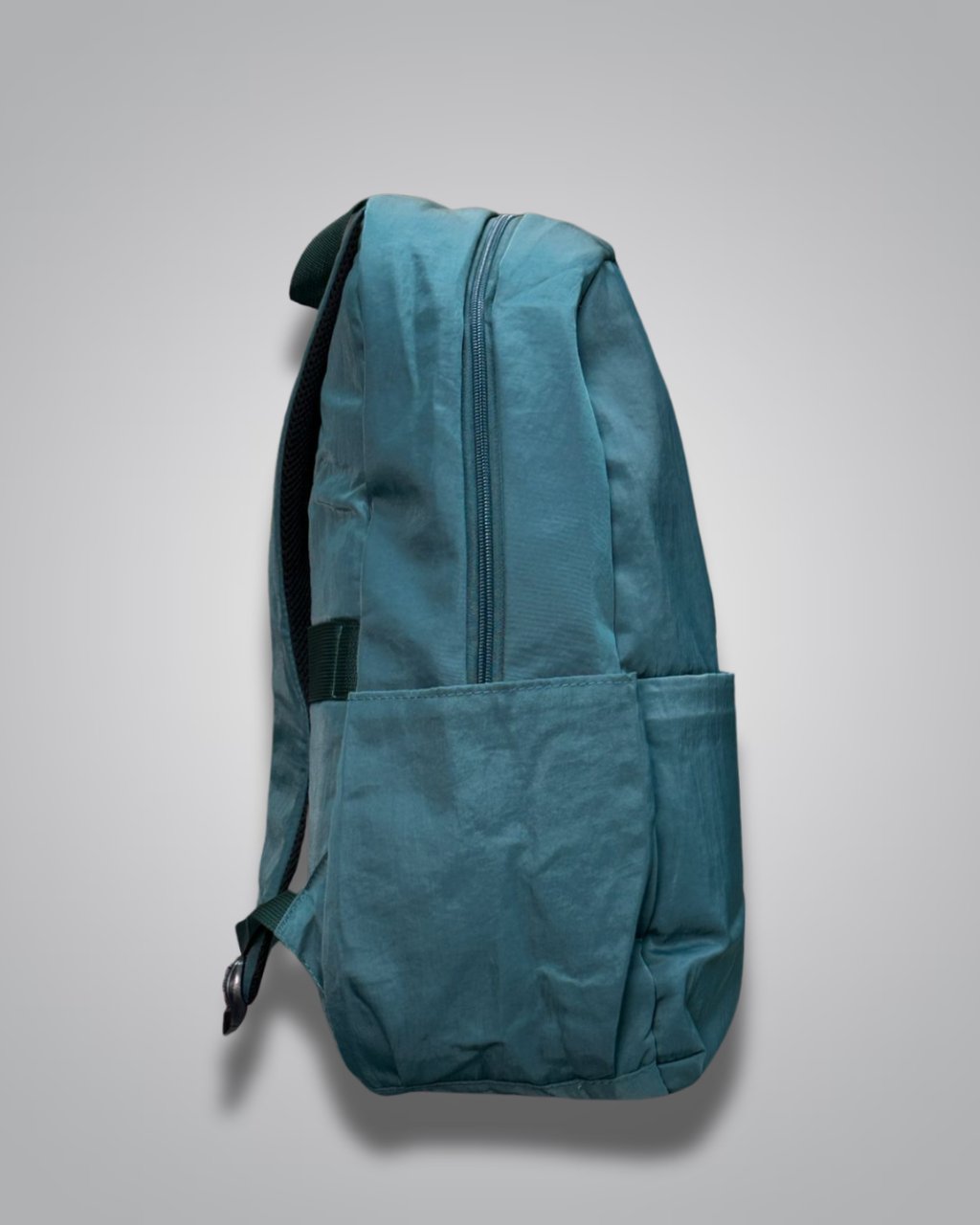 Teal backpack on a light gray background- valentini impex