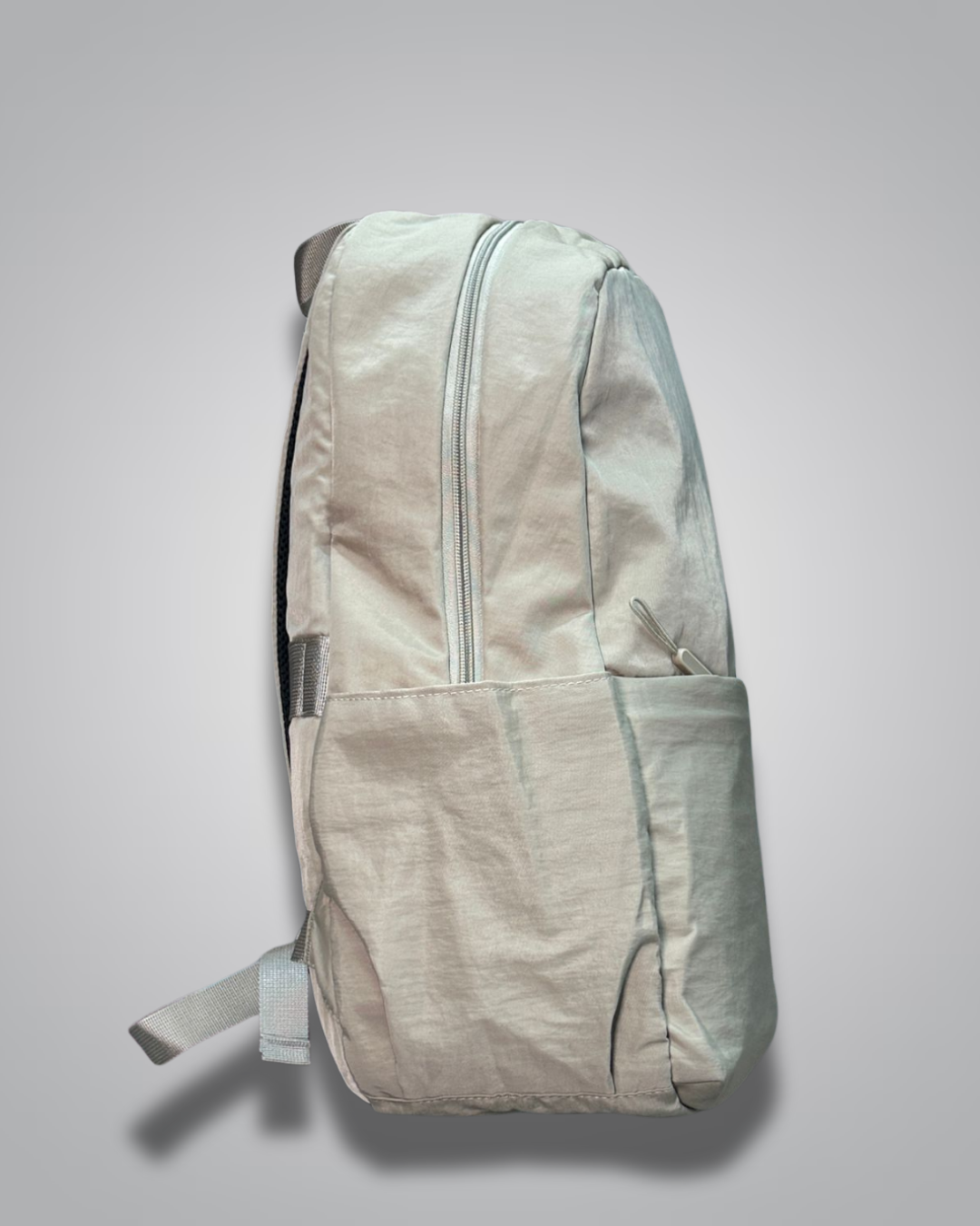 Light gray backpack on a light gray background- valentini impex