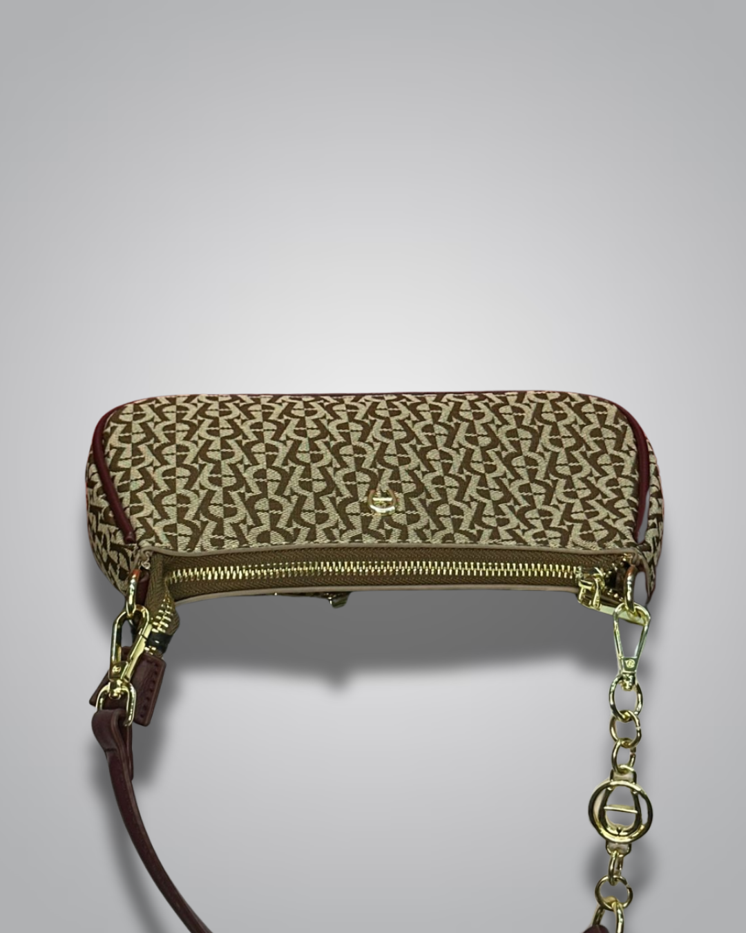 Handbag with monogram pattern on a gray background- Valentino Impex