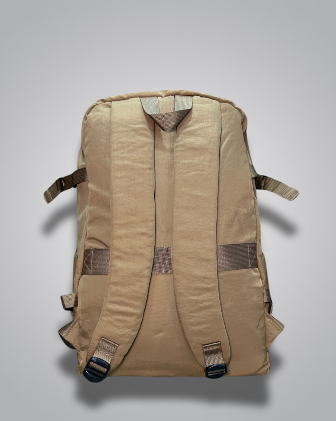 Brown backpack with a visible brand tag on a gray background- Valentino Impex